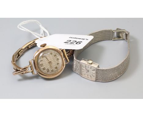 Tissot, a lady's 9ct gold white gold Tissot wristwatch, the square silvered dial with baton numerals with integral mesh strap