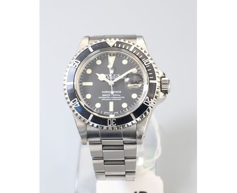 Rolex. A gentlemans stainless steel Rolex oyster perpetual submariner 1680 black enamel dial, luminous baton and dot markers,