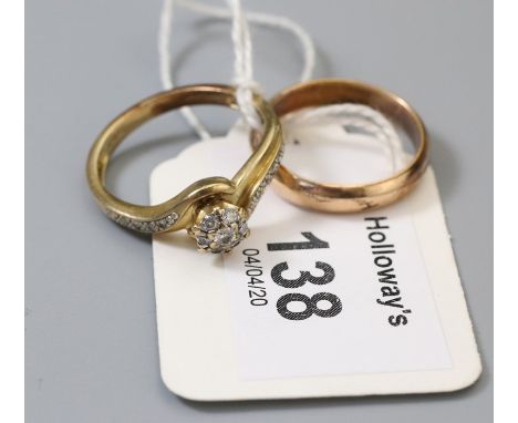 A diamond crossover ring, with central cluster and diamond set shoulders, together with a wedding band marked '14k',  gross w