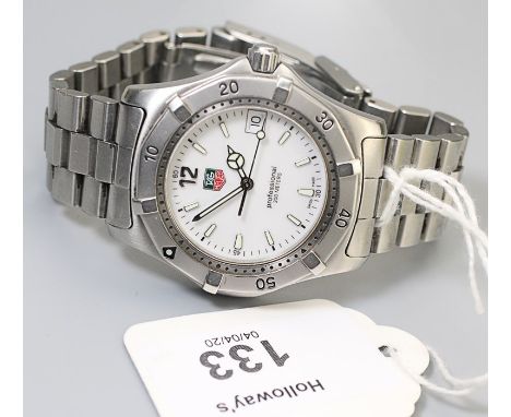 Tag Heuer,  a gentleman's Tag Heuer Professional 200 metres diver's wristwatch, stainless steel, white dial with luminous bat