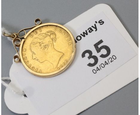A half sovereign pendant, the Victorian half sovereign dated 1866,k in 9ct gold pendant mount,  4.5g