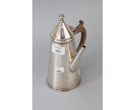 An early 20th century silver conical cafe au lait pot, with urn finial and pear wood handle, Sheffield 1977 by Thomas Bradbur