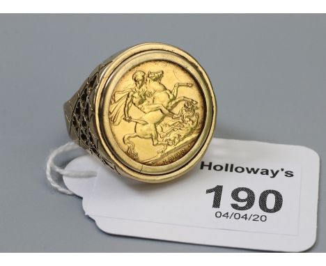 A gentleman's sovereign set ring, the sovereign dated 1903, inset to lattice pierced 9ct gold ring mount,  Ring size X, 16.8g