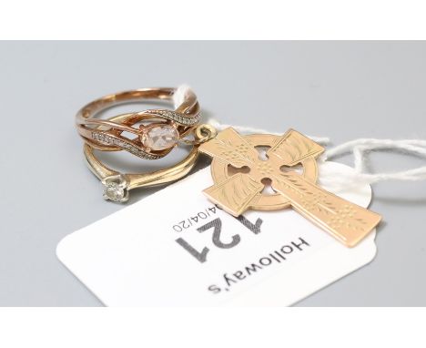 A single stone diamond ring, the brilliant cut diamond in four claw mount, a Celtic Cross pendant and a further gem-set ring,