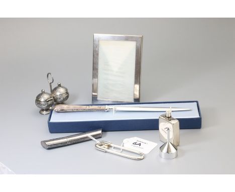 Tiffany. A silver Tiffany photo frame, plain rectangular, 11.5 x 8cm, together with a safety pin key ring signed and a small 