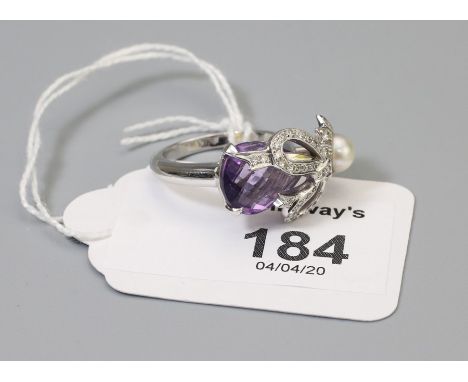 An amethyst, diamond and pearl ring, the horizontally set amethyst with applied diamond set bow and cultured pearl and diamon
