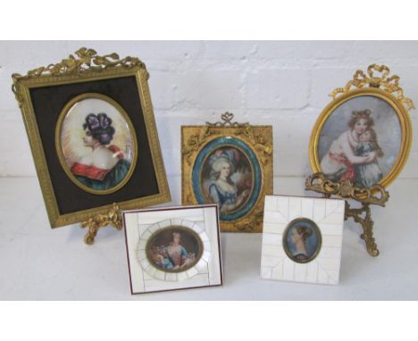 MINIATURES, five various, three in intricate gilt metal frames, the other in ivory frames, with two gilt metal easel stands, 