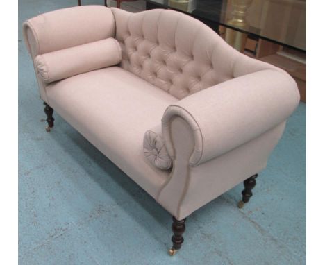 SOFA, two seater, buttoned back in neutral fabric on turned castor supports, 143cm L. 