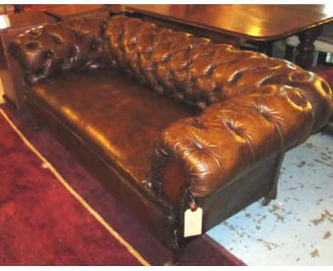 DROP END CHESTERFIELD SOFA, Edwardian tan brown leather with deep buttoned back and arms including drop arm on square taperin