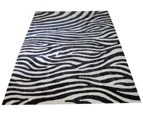 FINE BENARES ZEBRA PRINT CARPET, 304cm x 241cm, all over zebra print design. 