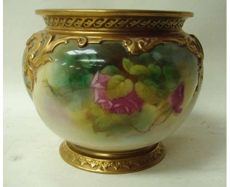 A Royal Worcester cache pot of compressed circular form, hand painted with pink roses on a gadrooned body under moulded scrol