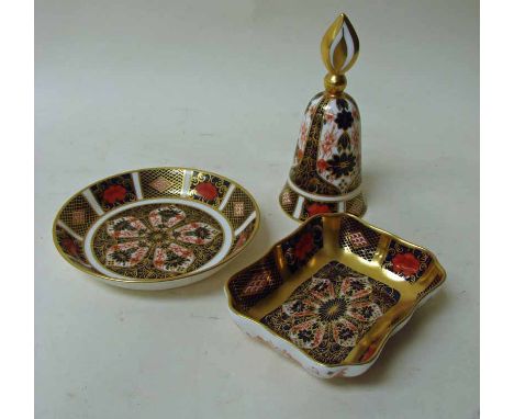 A Royal Crown Derby bone china bell, design 1128, 12cm high; a Royal Crown Derby pin tray of shaped rectangular form, design 