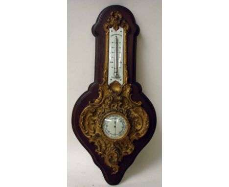 A French 19th century ormolu Barometer signed F Barbedienne, of typical form with mercury thermometer to neck on ivory colour