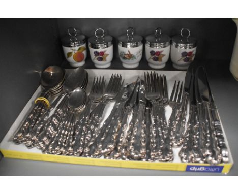 Six place settings of Oneida Community 'Beethoven' flatware and cutlery sold along with five Royal Worcester egg coddlers.