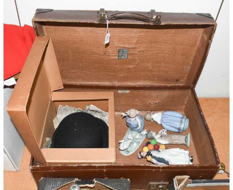 A Leather Suitcase, together with a Locke &amp; Co. bowler hat and four ceramic figures including NAO