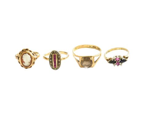 Three 9 Carat Gold Rings, comprising of a cameo example, a smoky quartz example, and a sapphire, ruby and diamond example; to