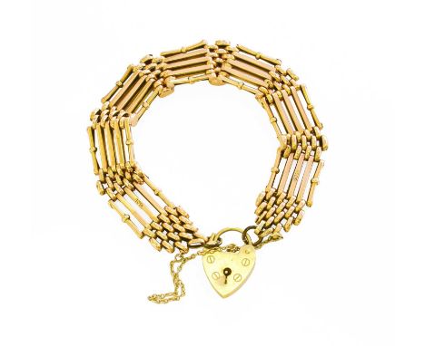 A Gate Link Bracelet, stamped '15CT', with a 9 carat gold heart shaped padlock clasp, length 18cmGross weight 18.7 grams.