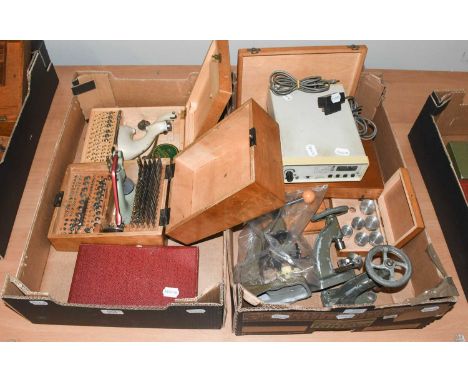 Watch and Clockmaker's Tools, including: two cased staking tools, a clock mainspring winder, a watch case back opening tool, 