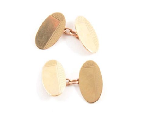 A pair of 9 carat yellow gold cufflinks, Birmingham 1984, part plain polished and part engine turned design, 7.6g.