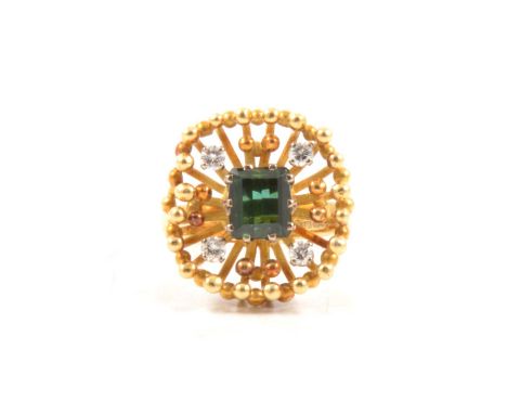 Thomas Payne and Peter Triggs - a 1970's green tourmaline and diamond ring, a rectangular step cut tourmaline, 6 x 6.8mm, cla