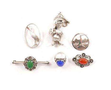 A collection of five silver brooches, a 55mm bar brooch with oval cabochon cut green onyx in floral frame ; a 35x25mm floral 