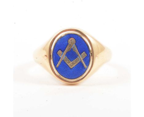 A 9 carat gold Masonic swivel signet ring size O,the oval plain polished head swivels to reveal the Masonic emblem on a blue 