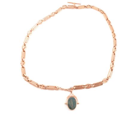 A modern reproduction 9 carat rose gold 8.5mm gauge double Albert watch chain, 20mm long cross pierced bars and 10mm star pie