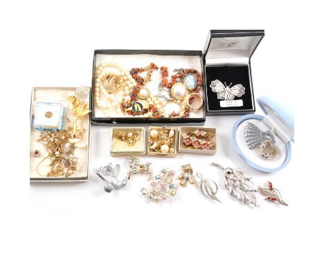 A collection of costume jewellery, a silver filigree butterfly brooch; simulated pearls; crystal rose bud brooch; paste set n