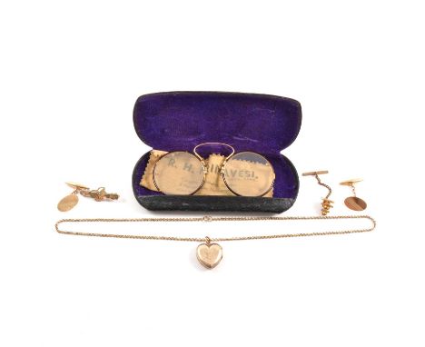 A pair of 9 carat gold cufflinks, locket and chain, brooch, spectacles, a pair of oval part engine turned 9 carat gold cuffli