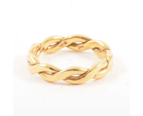 A 9 carat yellow gold 4.5mm wide double twist ring size N, plain polished finish, gross weight 5g. new, unworn and boxed.