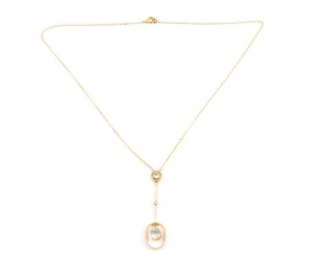 An aquamarine pendant and chain, a rectangular cushion cut aquamarine set in a yellow metal collet in an oval frame, suspende