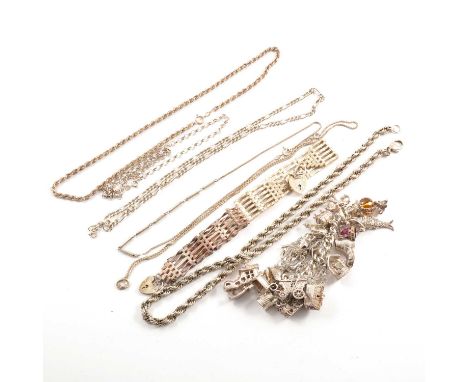 A silver curb link charm bracelet with twenty-one large charms, gross weight 3.3oz; silver six bar and silver five bar gate l