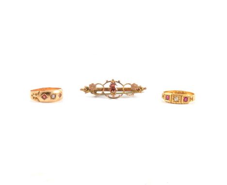 Two Victorian ruby rings, an old cut diamond star set in an 18 carat yellow gold mount with a ruby to each side, ring size N,