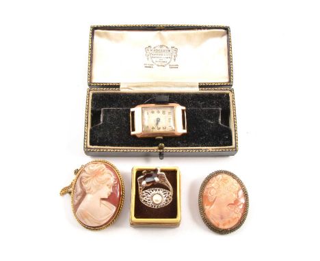 A 9 carat yellow gold wristwatch, simulated pearl ring, paste ring, and two cameo brooches, a 9 carat yellow gold wristwatch,