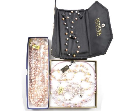 Seven cultured pearl necklaces, to include white, yellow, lavender and pink, single and multiple strands, with white metal cl