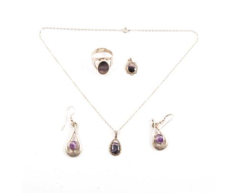 Blue John ring, pendants and earrings, a silver coloured ring size S set with an oval slice of blue John, 15x10mm; a pair of 