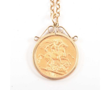 A Gold Full Sovereign Coin pendant and chain, George V, 1912, in a 9 carat yellow gold scroll top mount, on a 2.4mm gauge bel