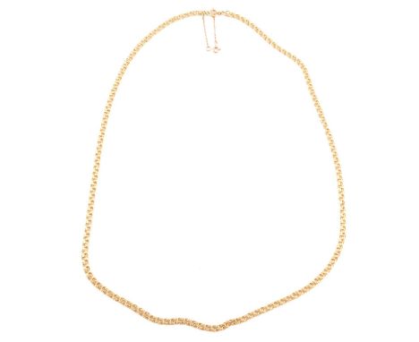 A yellow metal 4.2mm gauge fancy link chain, marked 750 and K18, with 9 safety chain attached, 61cm, total weight 20.1g.