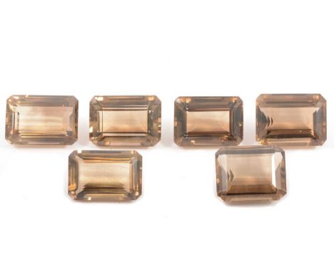 Six smoky quartz loose stones, all emerald step cut, all 31x20x12mm, total weight 79.5g.Qty: 6