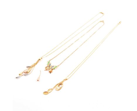 Three yellow metal pendants, a 20mm enamel butterfly pendant with a 1.2mm gauge box link chain attached to each side marked 7