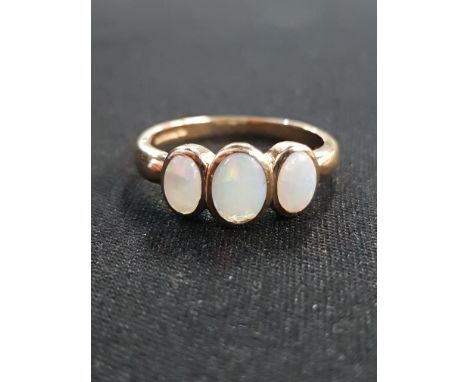 9 CARAT GOLD 3 STONE OPAL RING