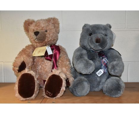 TWO TEDDY BEARS, comprising a Gund 'Blue Thunder' teddy bear no 2254, with blue grey 'fur' and attached swing tag, seated hei