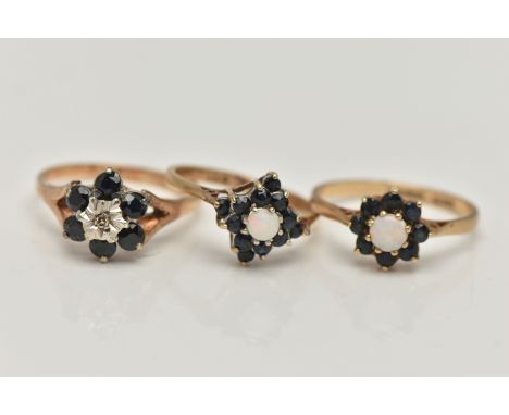 THREE 9CT GOLD GEM SET RINGS, the first an opal and dark blue sapphire cluster ring, hallmarked 9ct Birmingham, ring size N 1