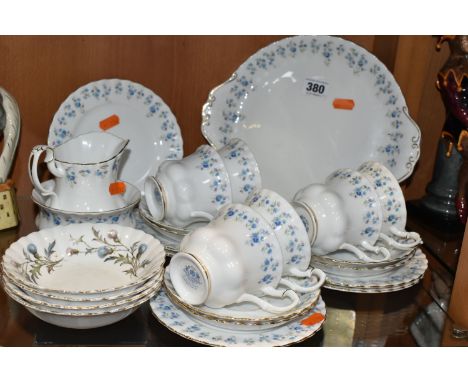 A TWENTY ONE PIECE ROYAL ALBERT 'MEMORY LANE' TEA SET, comprising a cake plate, a cream jug, a sugar bowl (hairline on foot r