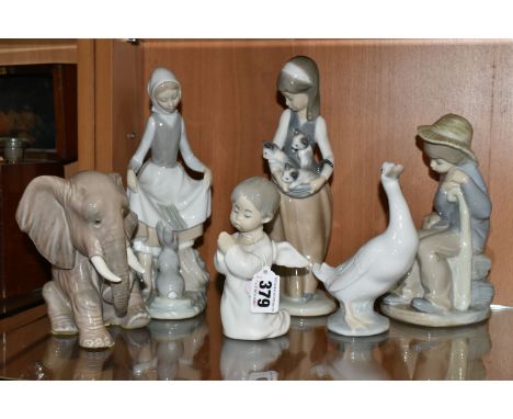 SIX LLADRO, NAO AND SIMILAR FIGURES, comprising Lladro: Painful Elephant no 5020, issued 1978 - 1981, sculptor Juan Huerta, A