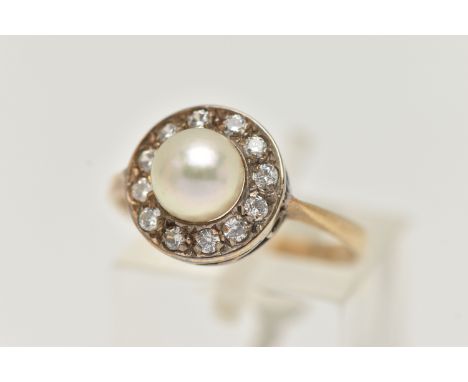A 9CT GOLD CLUSTER RING, designed as a central cultured pearl, within a circular cut cubic zirconia surround, 9ct hallmark fo