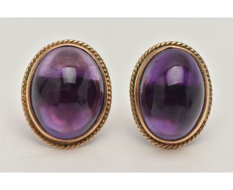 A PAIR OF AMETHYST CABOCHON STUD EARRINGS, the oval cabochon in a collet setting with rope twist surround, butterfly earring 