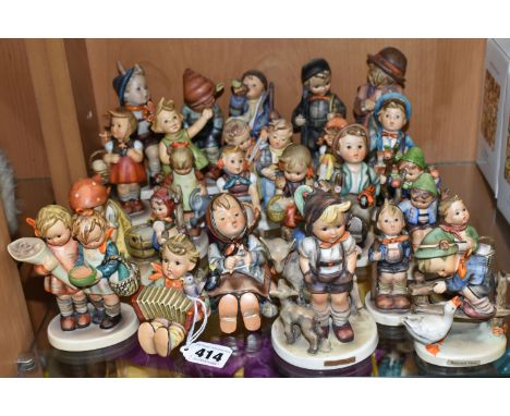 A GROUP OF TWENTY SIX MID-CENTURY GOEBEL FIGURES, comprising 195 Barnyard Hero, 110 Lets Sing, 69 Happy Pastime, 81 School Gi