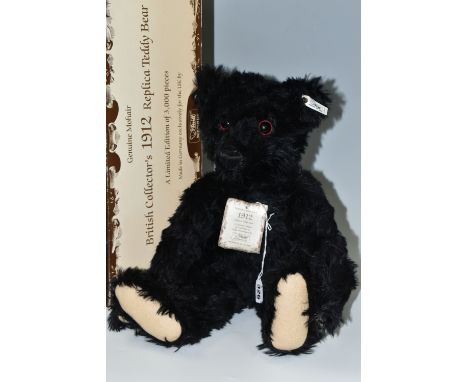 A STEIFF LIMITED EDITION '1912 REPLICA' TEDDY BEAR, with partial box, black mohair 'fur' with beige felt pads, gold coloured 