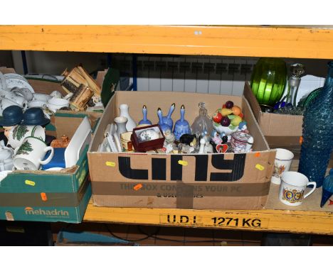 FOUR BOXES OF CERAMICS AND GLASSWARE, to include a turquoise Genie bottle (chipped stopper), Royal Commemorative mugs and a c